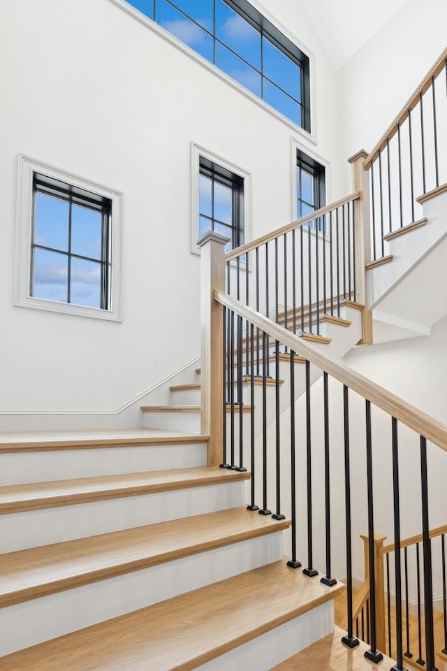 staircase featuring plenty of natural light