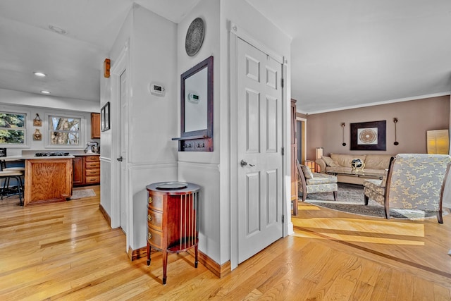 hall featuring light wood-type flooring