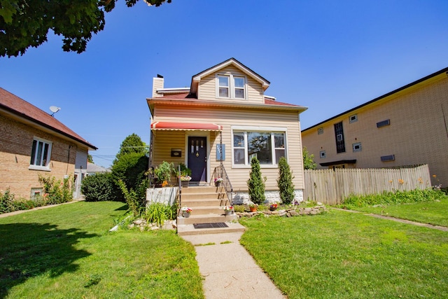 view of front facade with a front lawn