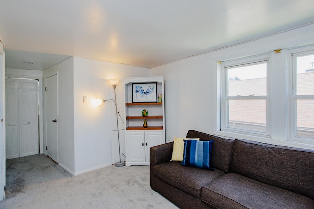 living room featuring light colored carpet