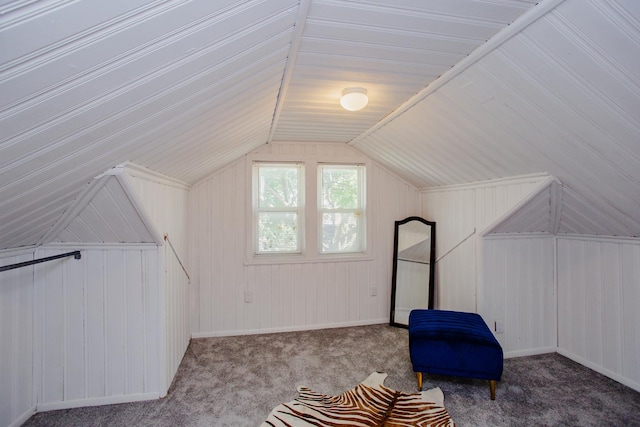 bonus room featuring lofted ceiling and carpet flooring