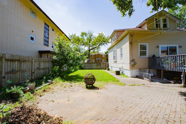 view of patio / terrace with a fire pit