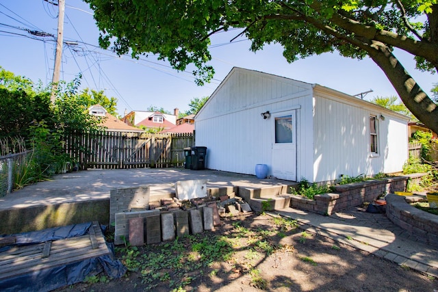 back of property featuring a patio