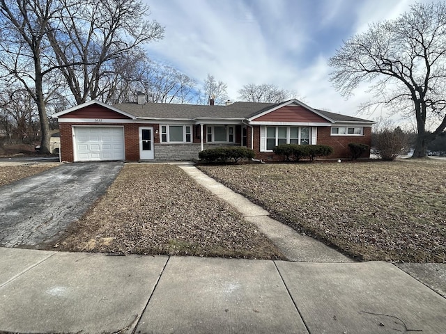 single story home with a garage