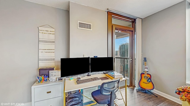 office space featuring hardwood / wood-style floors