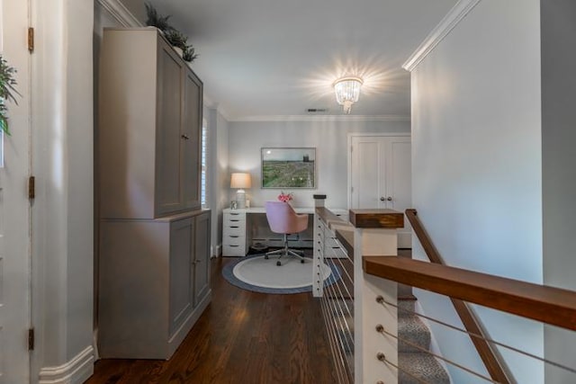 hallway featuring crown molding and dark hardwood / wood-style flooring