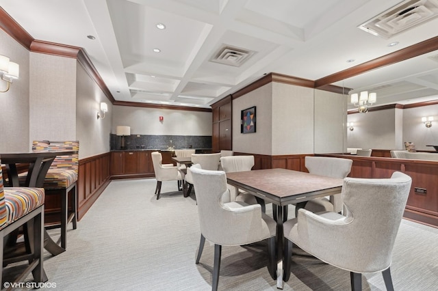 dining space featuring coffered ceiling, beam ceiling, light carpet, and crown molding