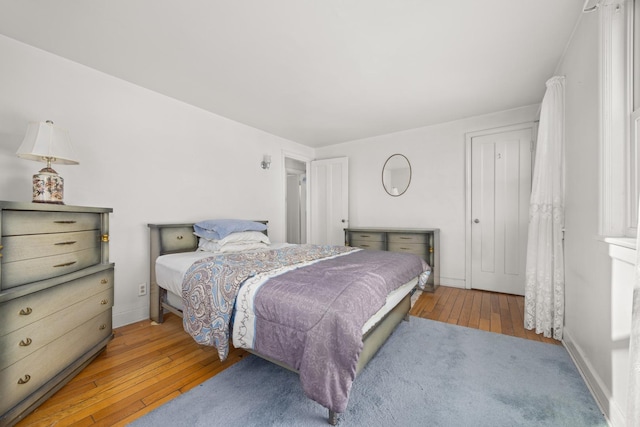 bedroom with light hardwood / wood-style flooring