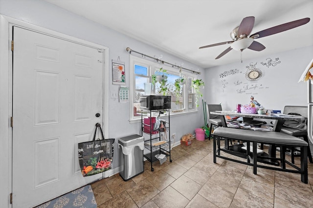 dining room featuring ceiling fan