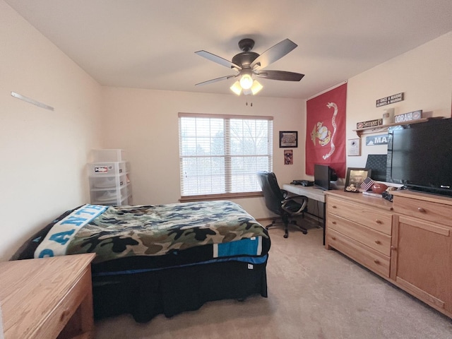 bedroom with light colored carpet and ceiling fan