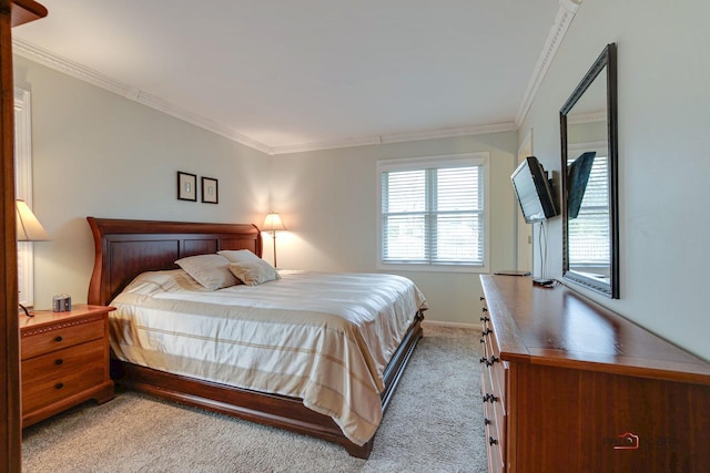 carpeted bedroom with crown molding