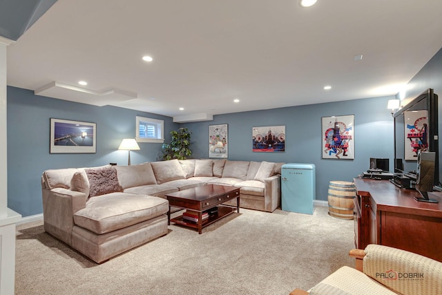 living room with light carpet and a wall unit AC