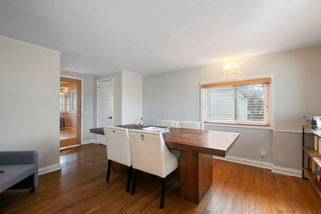 dining room featuring dark wood-type flooring