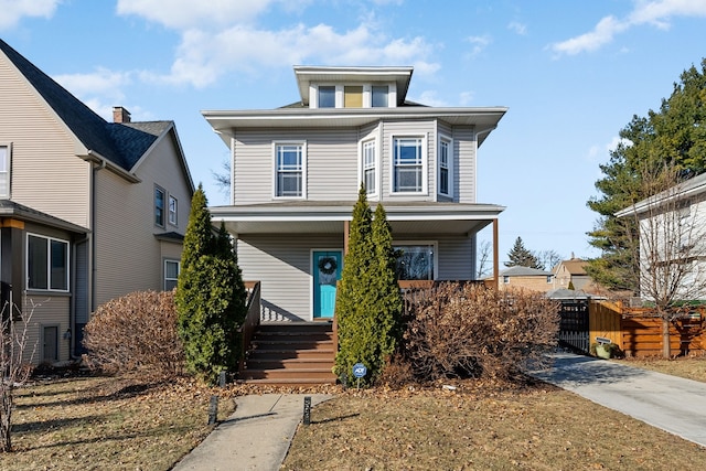 view of front property featuring covered porch