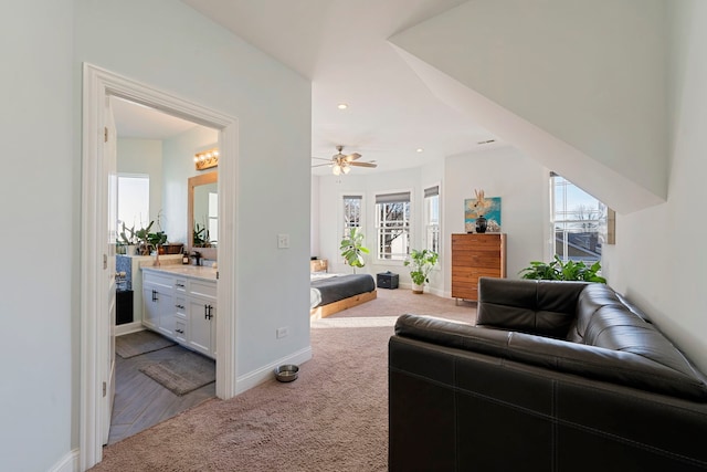 living room featuring light carpet