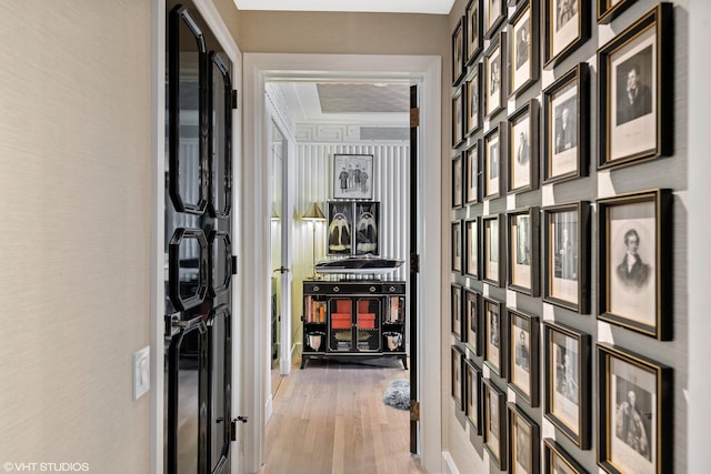 hall with light hardwood / wood-style flooring