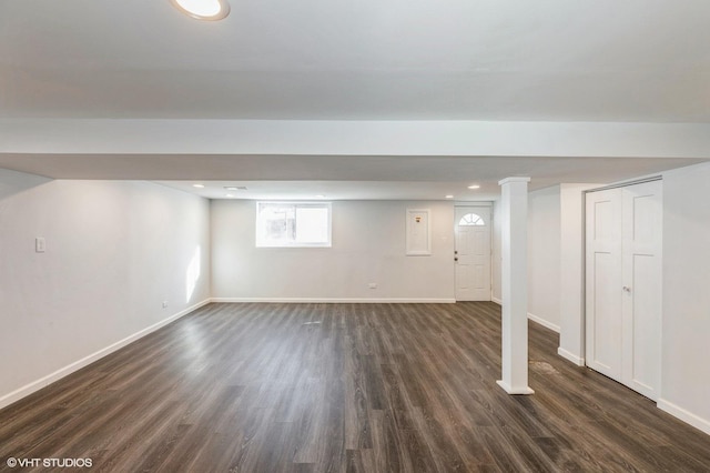 basement featuring dark wood-type flooring