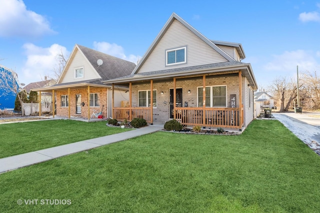 view of front facade featuring a porch and a front yard