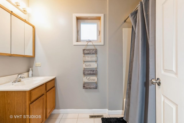 bathroom featuring vanity and tile patterned flooring