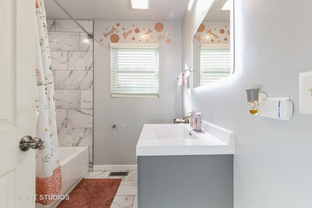 bathroom with shower / bath combination with curtain and vanity