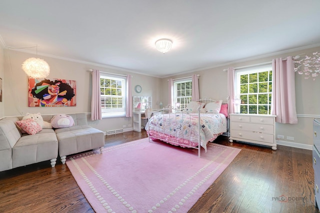 bedroom with ornamental molding and dark hardwood / wood-style floors