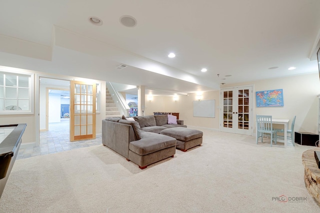 living room with light carpet and french doors