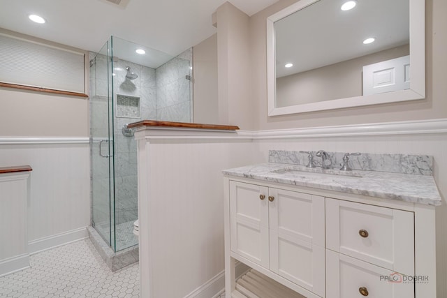 bathroom featuring vanity and walk in shower