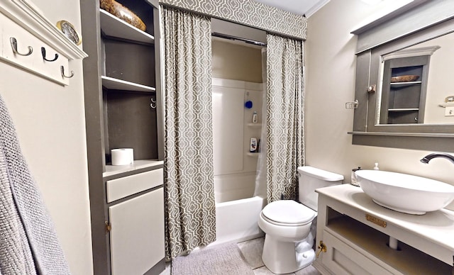 full bathroom featuring vanity, shower / tub combo with curtain, and toilet