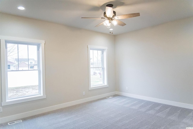 2500 Taylor Dr, Quincy, IL 62305 - unfurnished room featuring a ceiling fan, plenty of natural light, baseboards, and recessed lighting