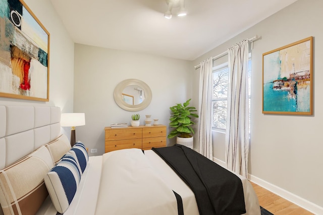 bedroom featuring hardwood / wood-style floors