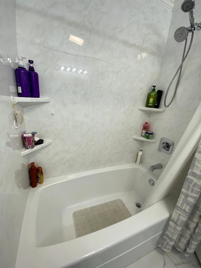 bathroom with shower / tub combo