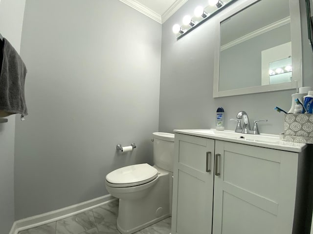 bathroom with crown molding, vanity, and toilet