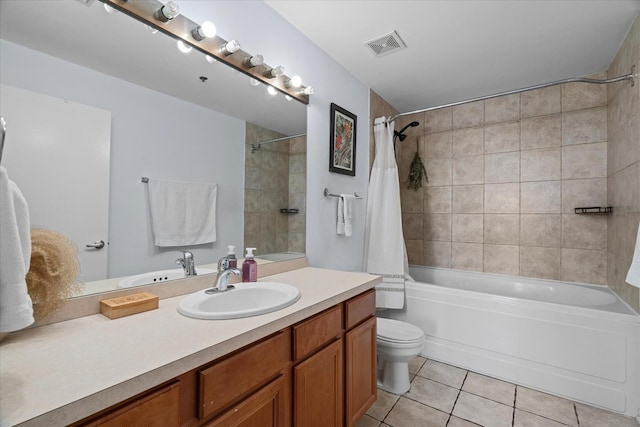 full bathroom featuring vanity, shower / bathtub combination with curtain, tile patterned floors, and toilet