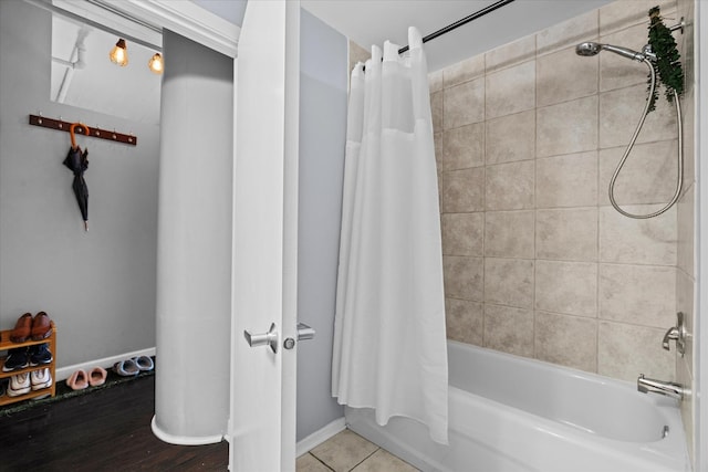 bathroom with shower / bath combination with curtain