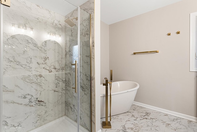 bathroom featuring shower with separate bathtub