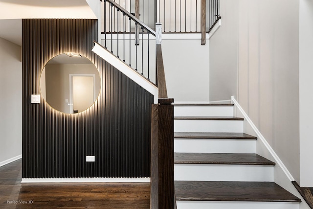 stairs with hardwood / wood-style flooring