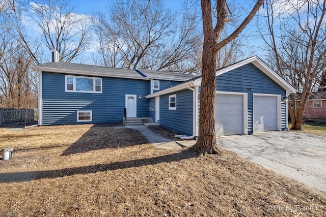 view of front of home with a garage