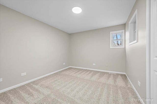 view of carpeted spare room