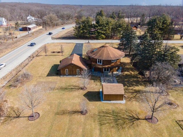 birds eye view of property featuring a rural view