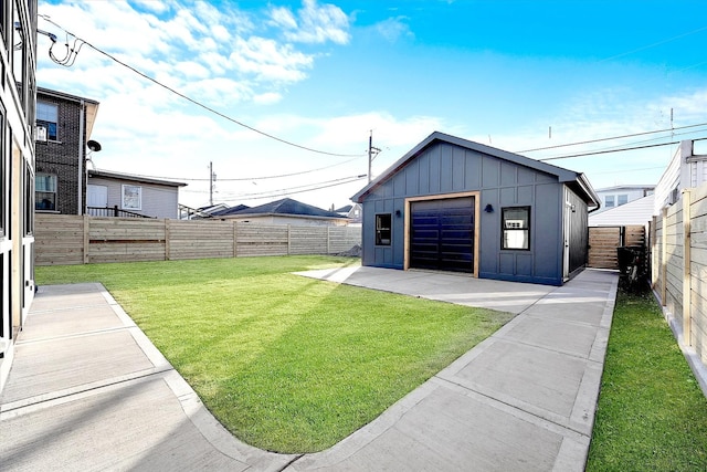 garage featuring a yard