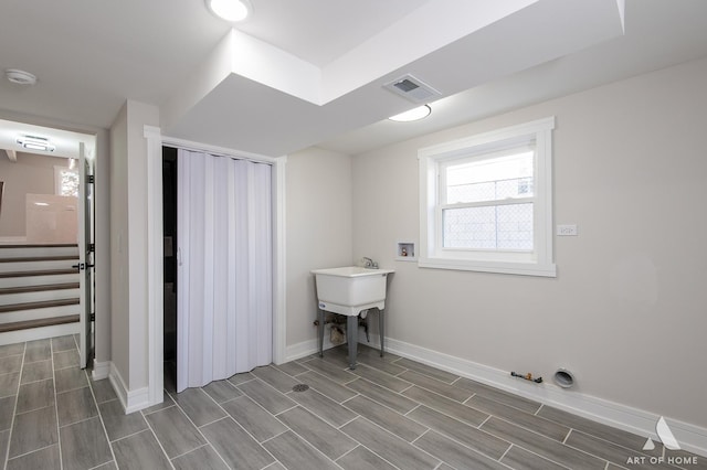 laundry area with gas dryer hookup, sink, and washer hookup