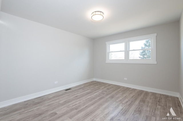 empty room featuring light hardwood / wood-style floors