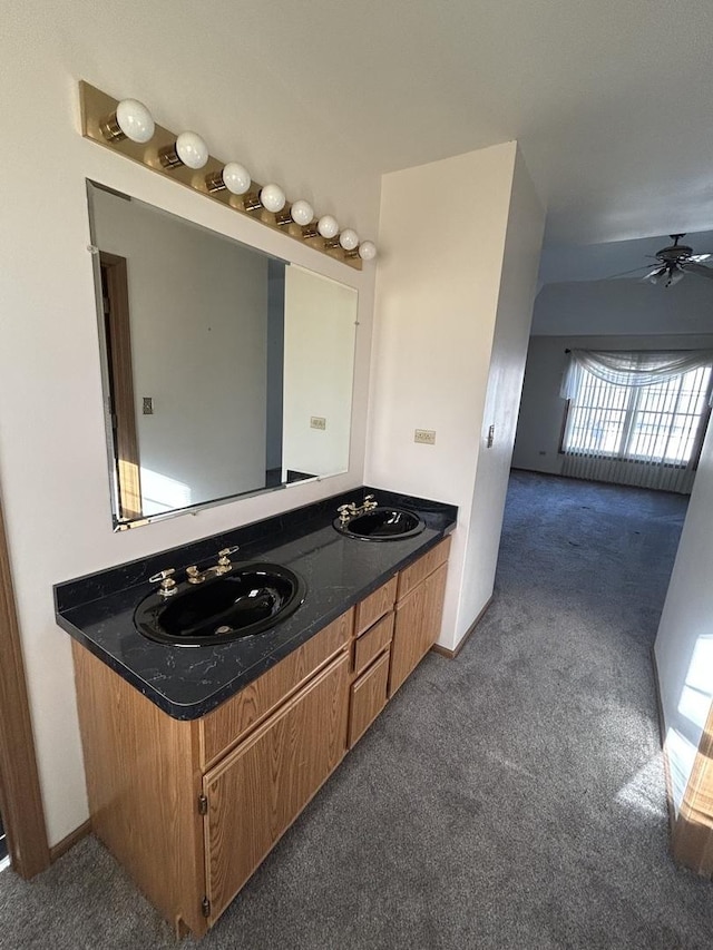 bathroom with vanity and ceiling fan