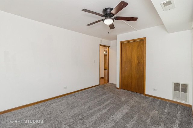 unfurnished bedroom with a closet, ceiling fan, and carpet