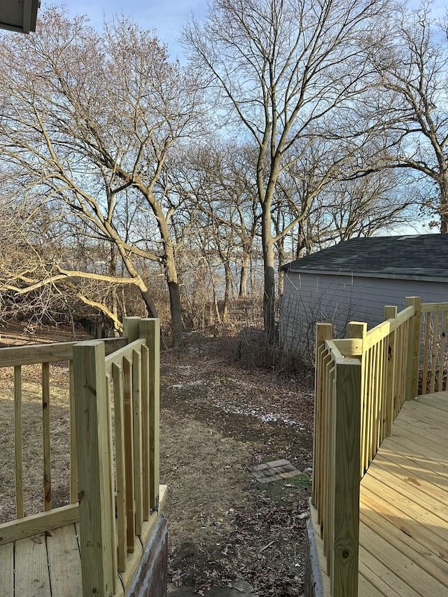 view of yard featuring a wooden deck