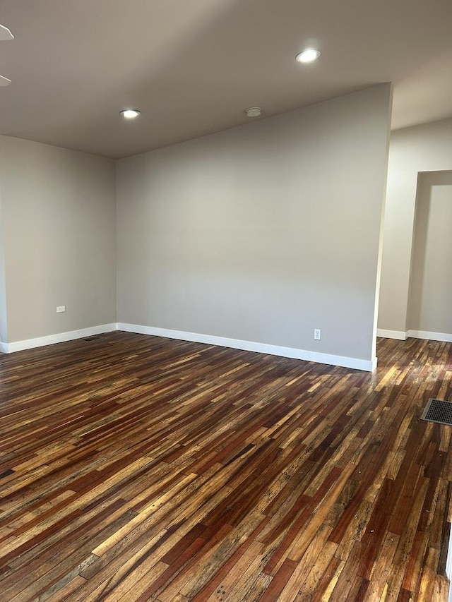 empty room featuring dark hardwood / wood-style floors