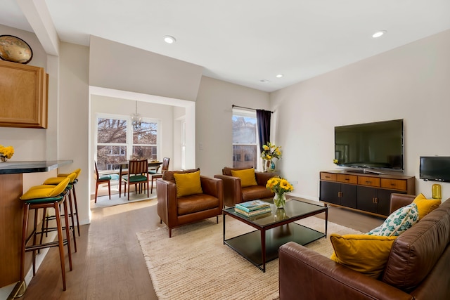 living room with light hardwood / wood-style flooring