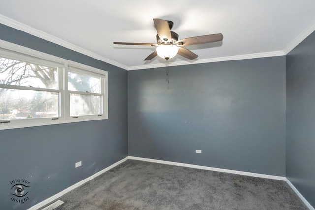 unfurnished room with crown molding, carpet floors, and ceiling fan