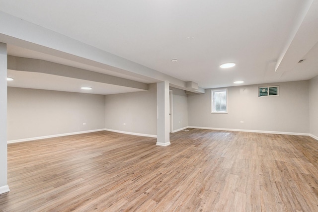 basement with light wood-type flooring