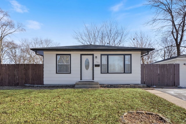 view of front of property with a front lawn